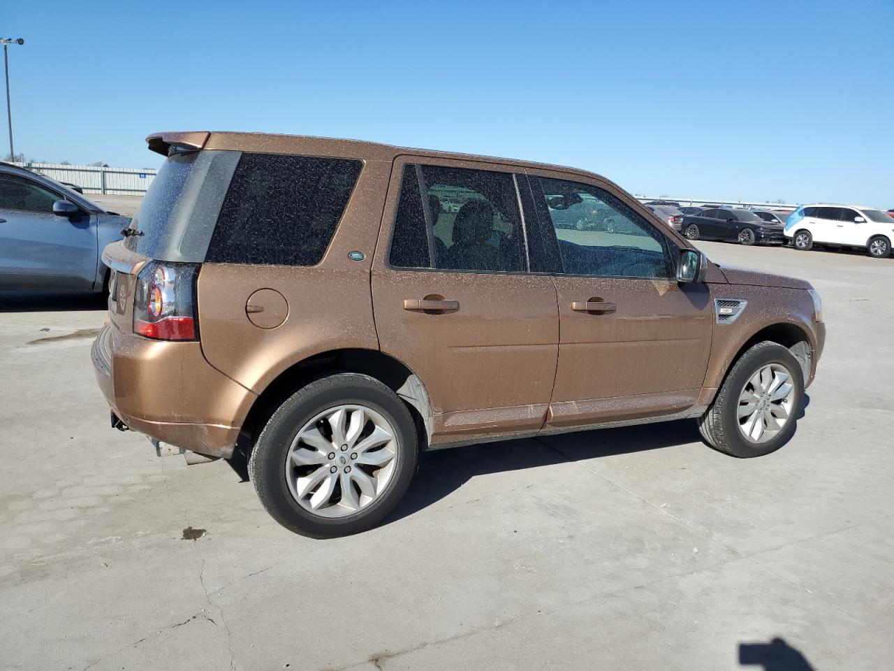2014 Land Rover LR2 VIN SALFR2BG9EH384187 Copart auction photo, side damage thumbnail 3