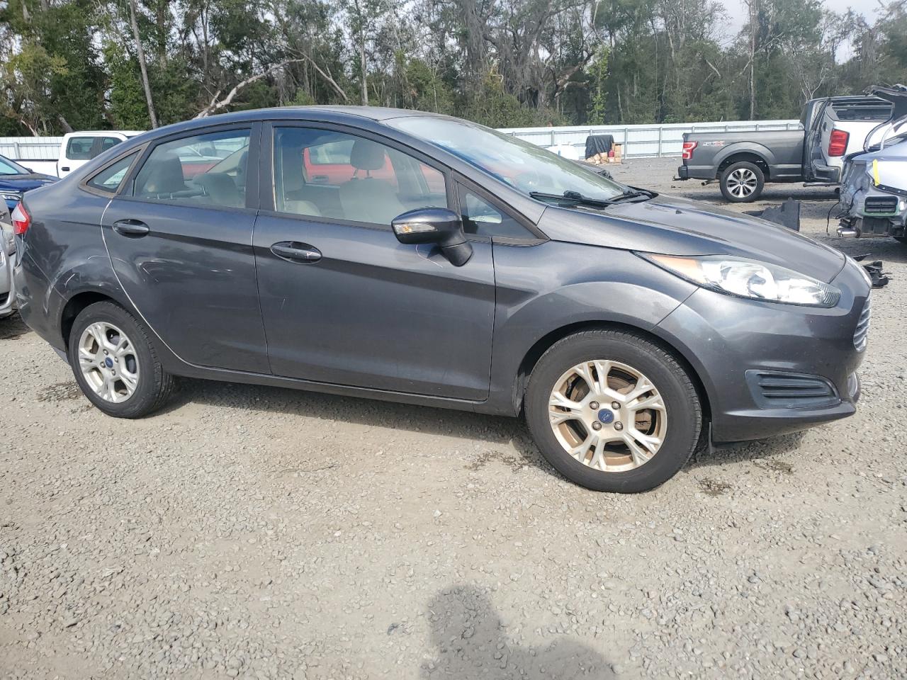 2016 Ford Fiesta VIN 3FADP4BJ7GM166717 Copart auction photo, side damage thumbnail 4