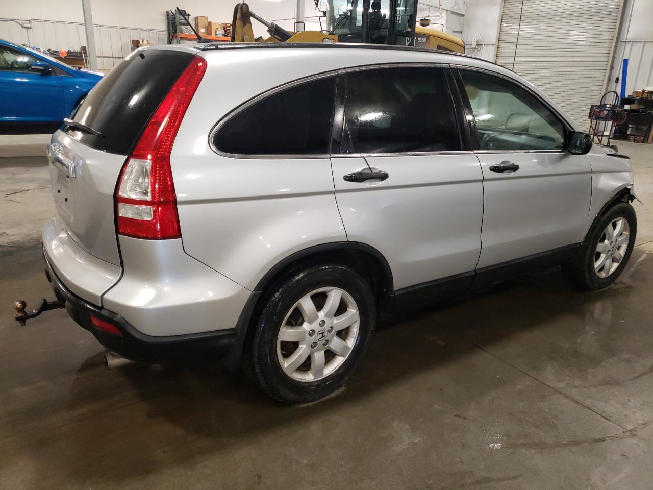 2009 Honda CR-V VIN 3CZRE38509G700646 Copart auction photo, front end / side damage thumbnail 3