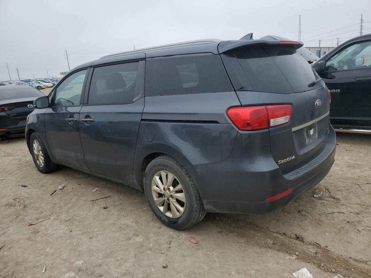 2015 KIA Sedona VIN KNDMB5C18F6061311 Copart auction photo, front end damage thumbnail 2