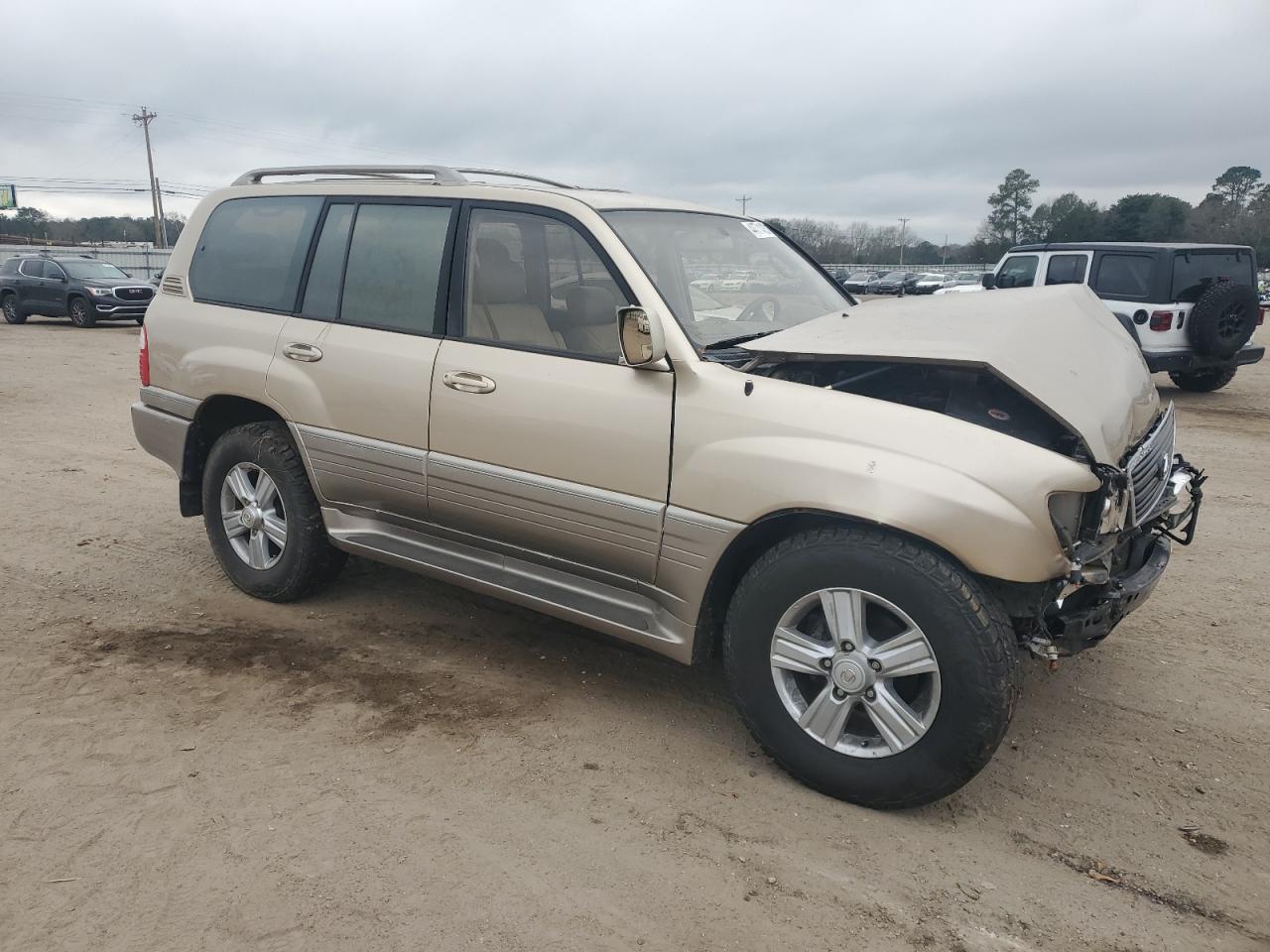 2000 Lexus LX VIN JT6HT00W5Y0103237 Copart auction photo, front end / side damage thumbnail 4