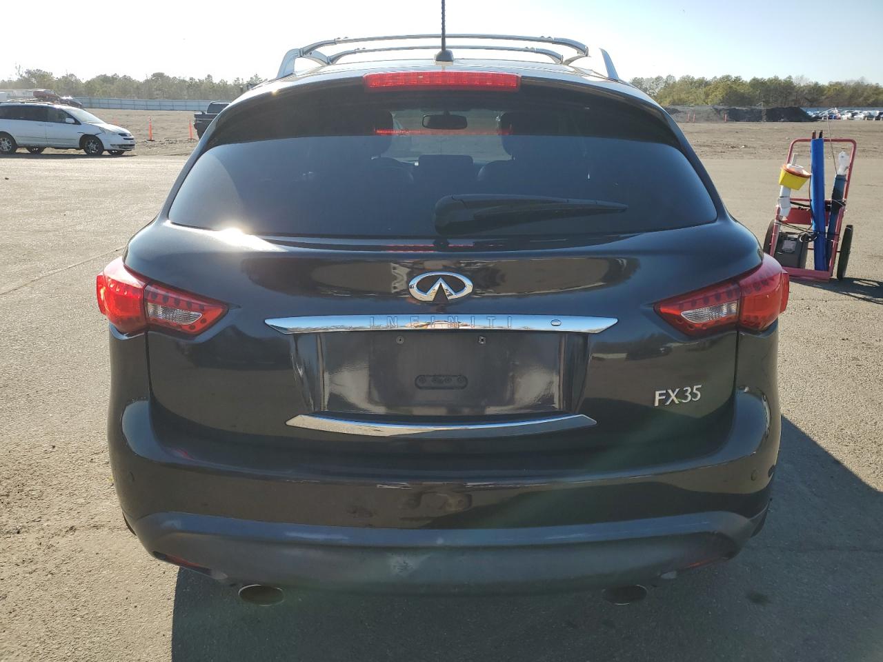 2010 Infiniti FX VIN JN8AS1MW2AM852299 Copart auction photo, side / minor dent/scratches damage thumbnail 6