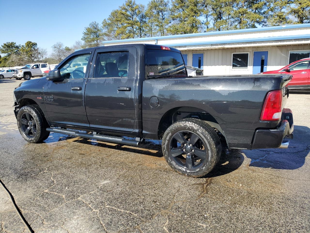 2015 RAM 1500 VIN 3C6RR6KT4FG687390 Copart auction photo, all over / side damage thumbnail 2