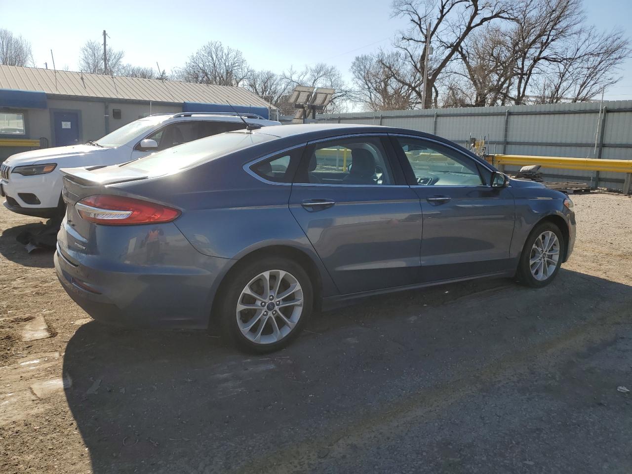2019 Ford Fusion VIN 3FA6P0SU7KR145552 Copart auction photo, burn - interior damage thumbnail 3