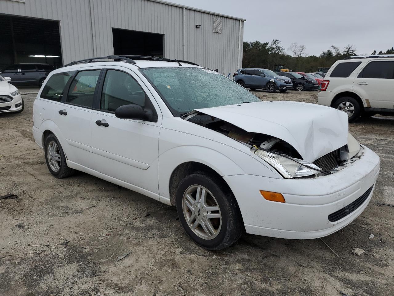 2000 Ford Focus VIN 1FAFP3634YW278181 Copart auction photo, front end damage thumbnail 4