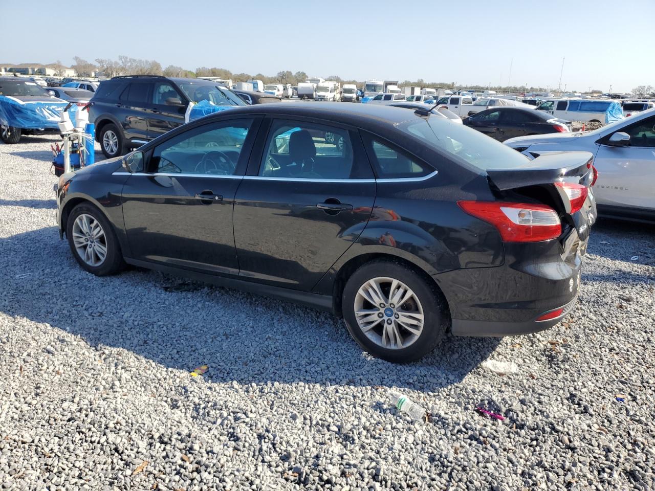 2012 Ford Focus VIN 1FAHP3H22CL374771 Copart auction photo, rear end damage thumbnail 2