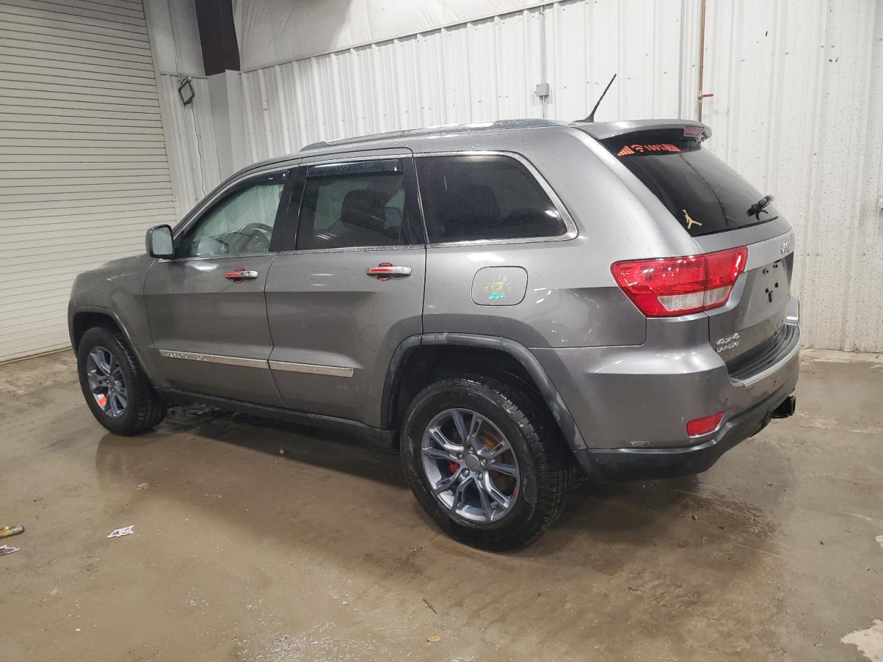 2012 Jeep Grand Cherokee VIN 1C4RJFAG2CC150682 Copart auction photo, side / rear end damage thumbnail 2