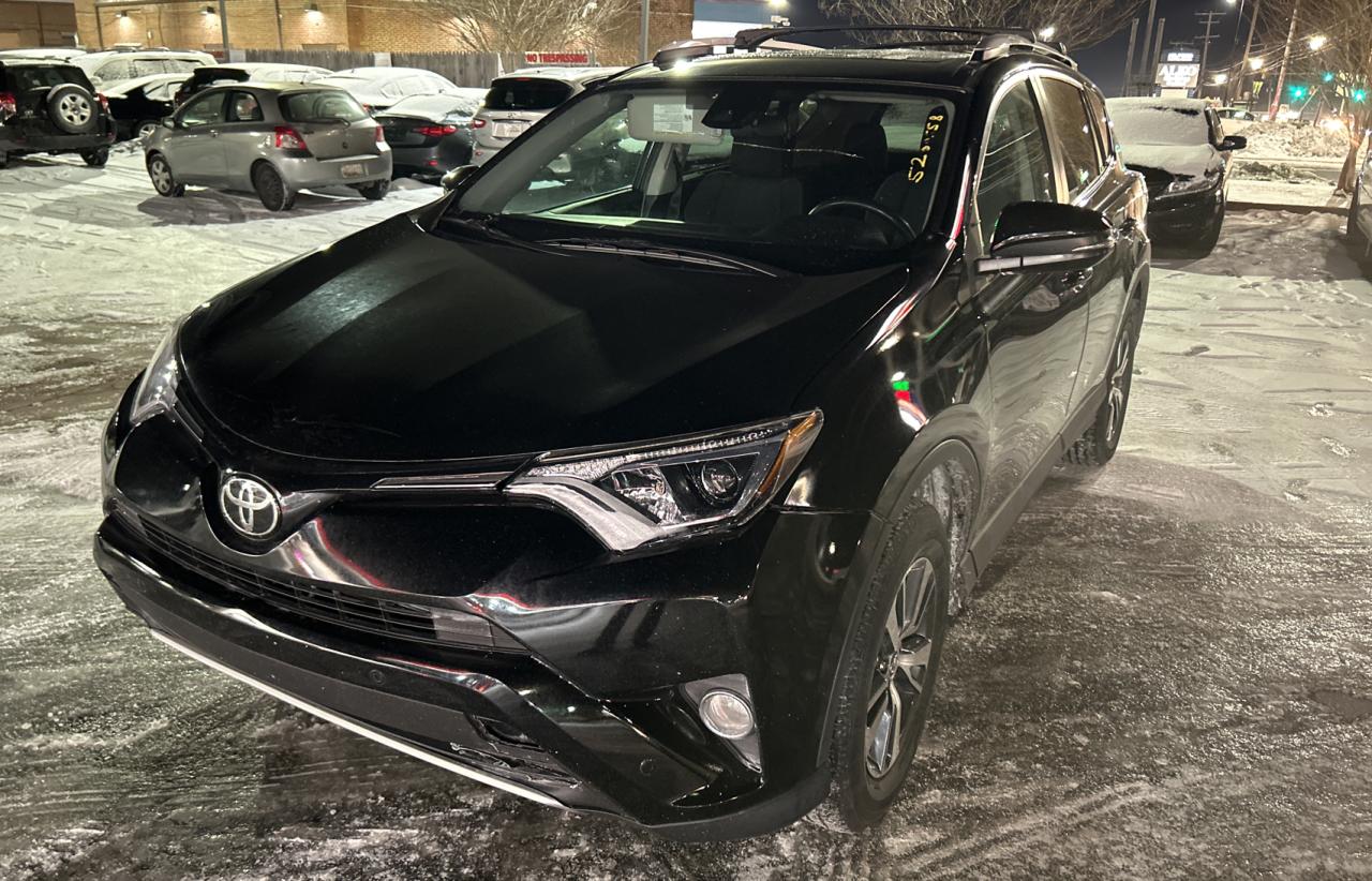 2016 Toyota RAV 4 VIN 2T3RFREV7GW506039 Copart auction photo, minor dent/scratches / normal wear damage thumbnail 2