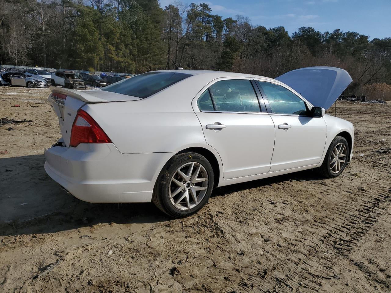 2010 Ford Fusion VIN 3FAHP0JA2AR285913 Copart auction photo, rear end / minor dent/scratches damage thumbnail 3