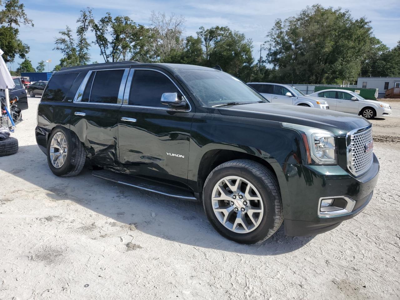 2016 GMC Yukon VIN 1GKS1BKC5GR358052 Copart auction photo, side / undercarriage damage thumbnail 4