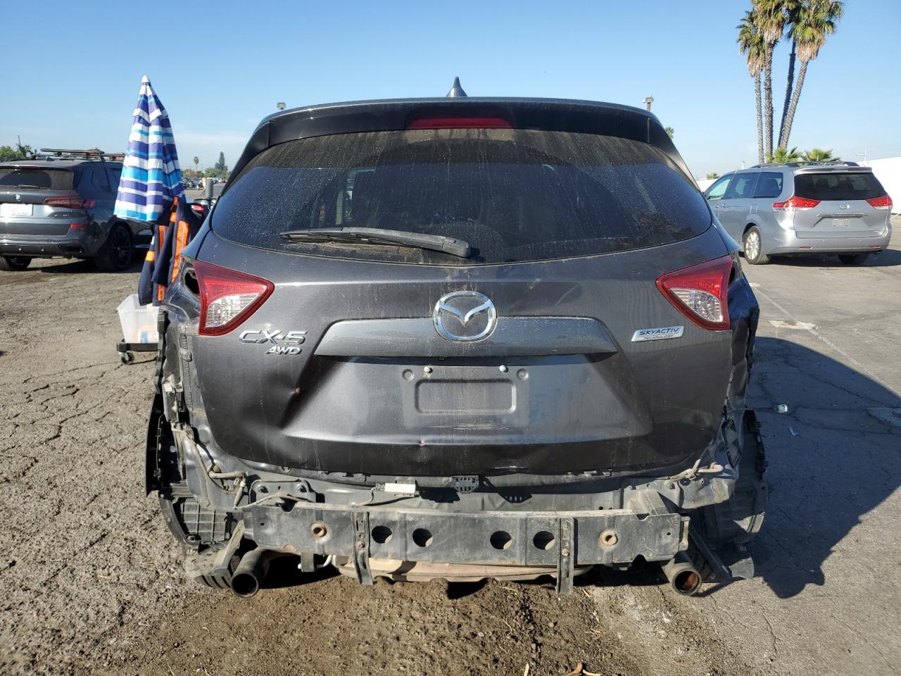 2016 Mazda CX-5 VIN JM3KE4CY8G0657164 Copart auction photo, rear end damage thumbnail 6