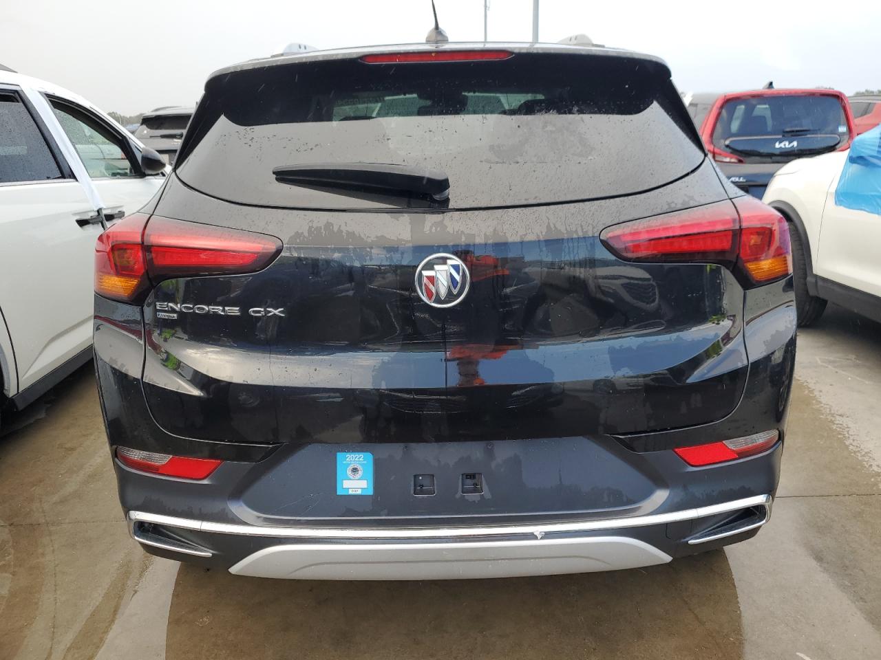 2021 Buick Encore VIN KL4MMGSL4MB170579 Copart auction photo, water/flood damage thumbnail 6