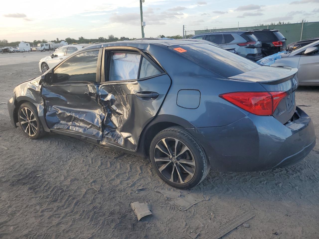 2018 Toyota Corolla VIN 5YFBURHE3JP817827 Copart auction photo, all over damage thumbnail 2