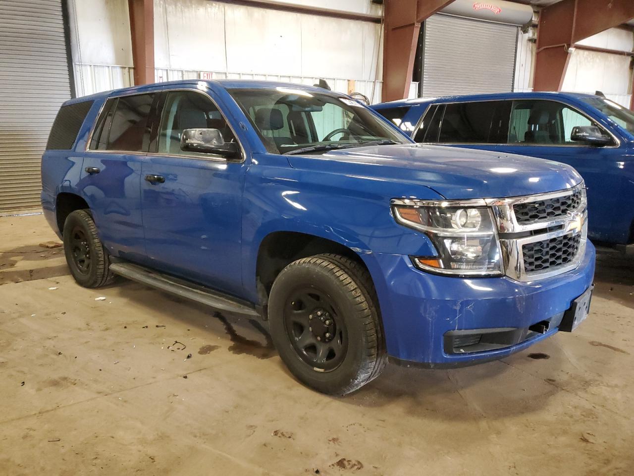 2018 Chevrolet Tahoe VIN 1GNSKDEC5JR311618 Copart auction photo, normal wear / mechanical damage thumbnail 4