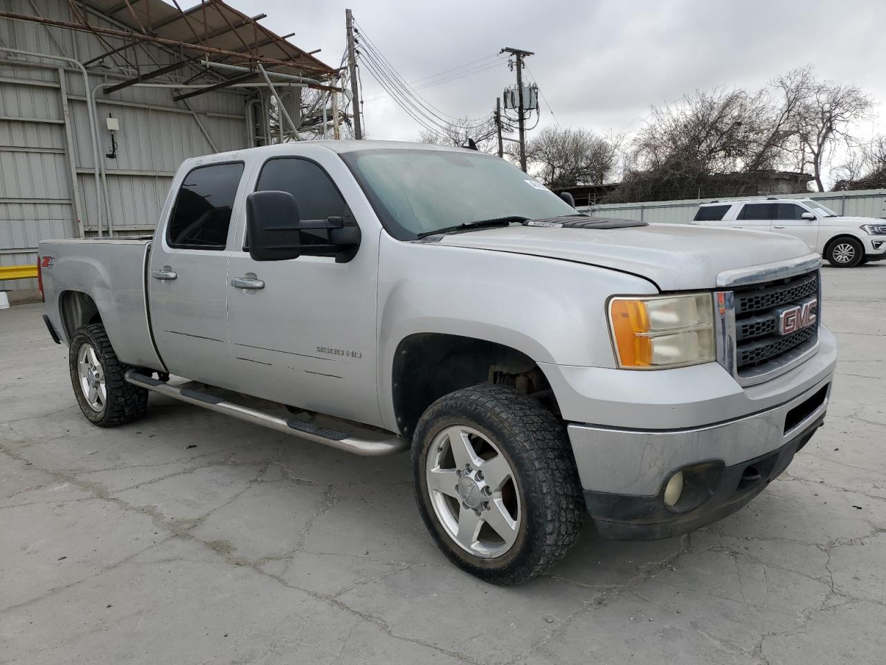 2011 GMC Sierra VIN 1GT121CG1BF101321 Copart auction photo, rear end damage thumbnail 4