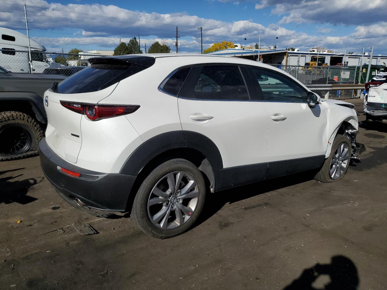 2021 Mazda CX-30 VIN 3MVDMBCL6MM217299 Copart auction photo, front end / side damage thumbnail 3