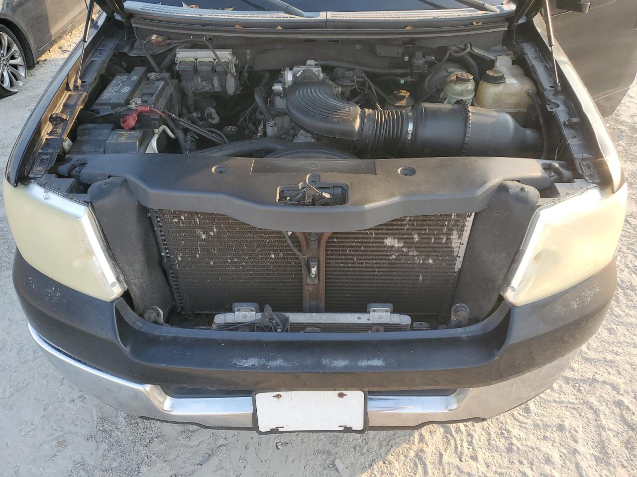 2005 Ford F-150 VIN 1FTRW12W65KE93224 Copart auction photo, minor dent/scratches damage thumbnail 11