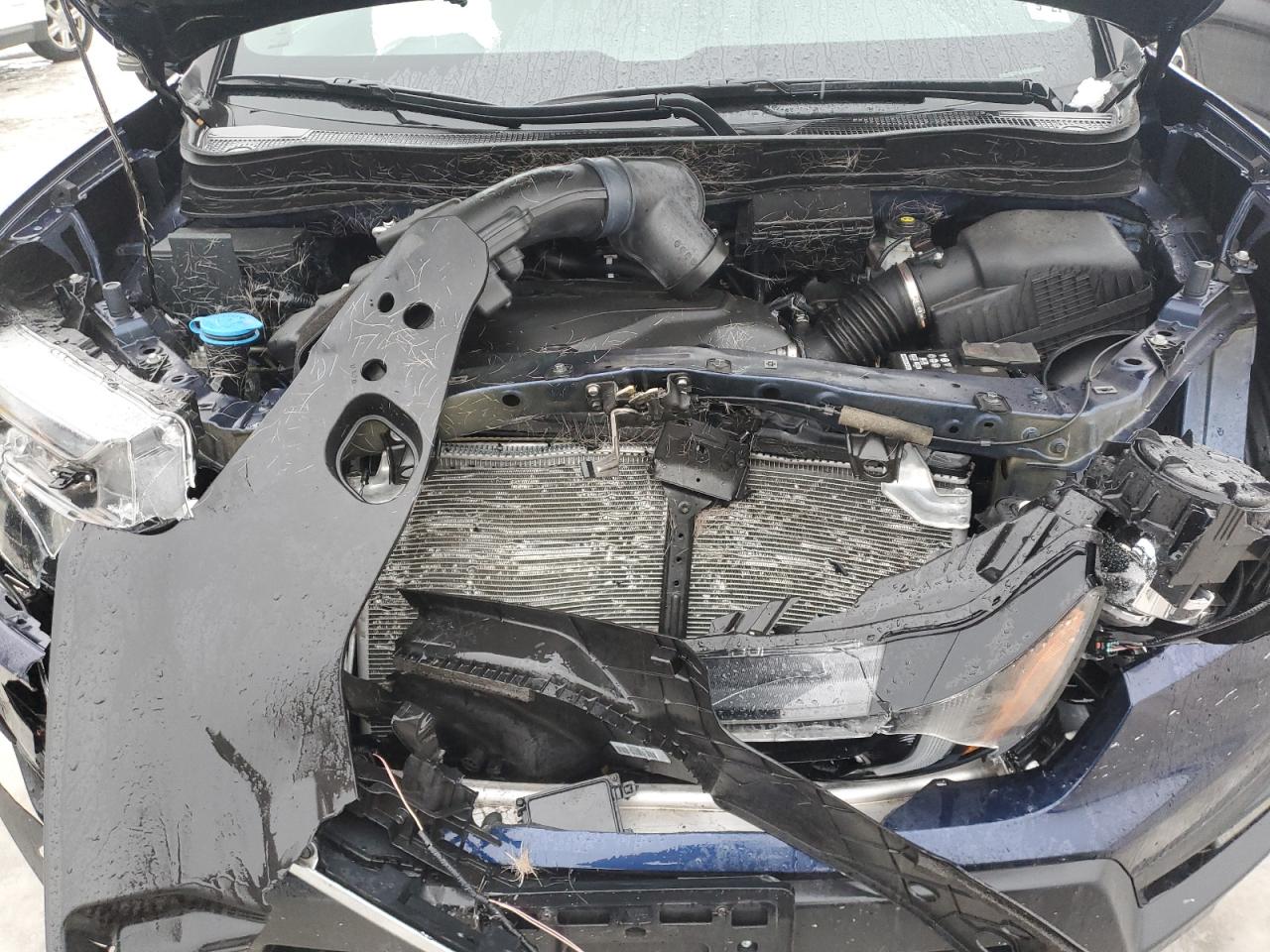 2022 Honda Passport VIN 5FNYF8H5XNB018899 Copart auction photo, front end damage thumbnail 12