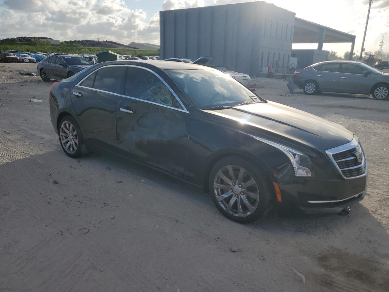 2017 Cadillac ATS VIN 1G6AB5RX0H0128216 Copart auction photo, side / front end damage thumbnail 4