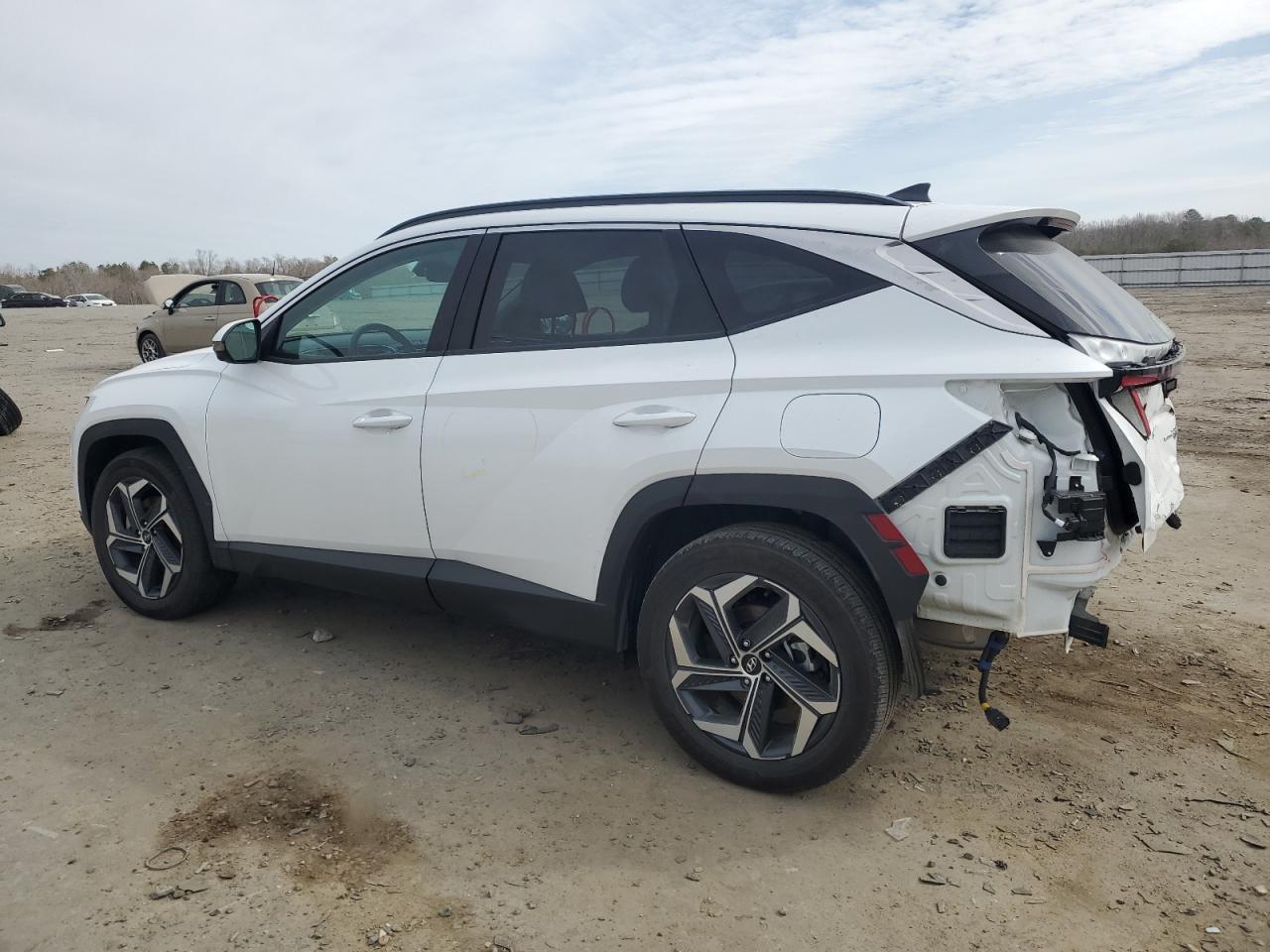 2022 Hyundai Tucson VIN KM8JECA16NU017122 Copart auction photo, rear end / stripped damage thumbnail 2