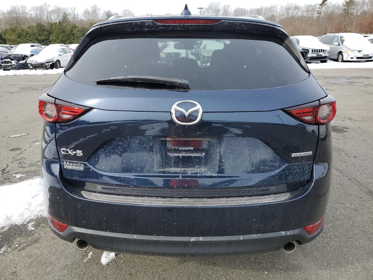 2021 Mazda CX-5 VIN JM3KFADM6M0367976 Copart auction photo, undercarriage / side damage thumbnail 6