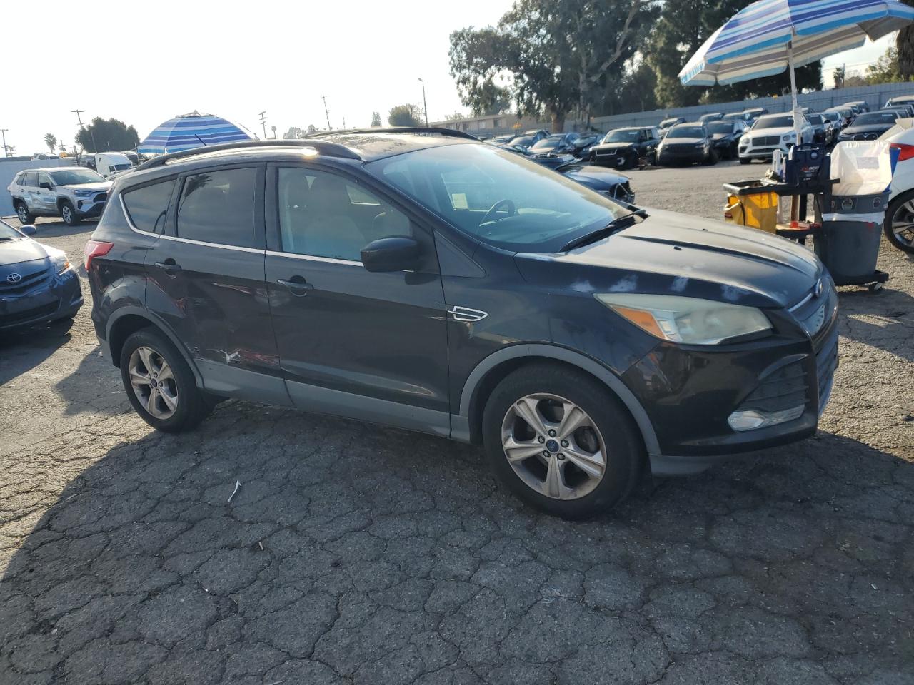 2015 Ford Escape VIN 1FMCU0GX4FUA18843 Copart auction photo, side / minor dent/scratches damage thumbnail 4