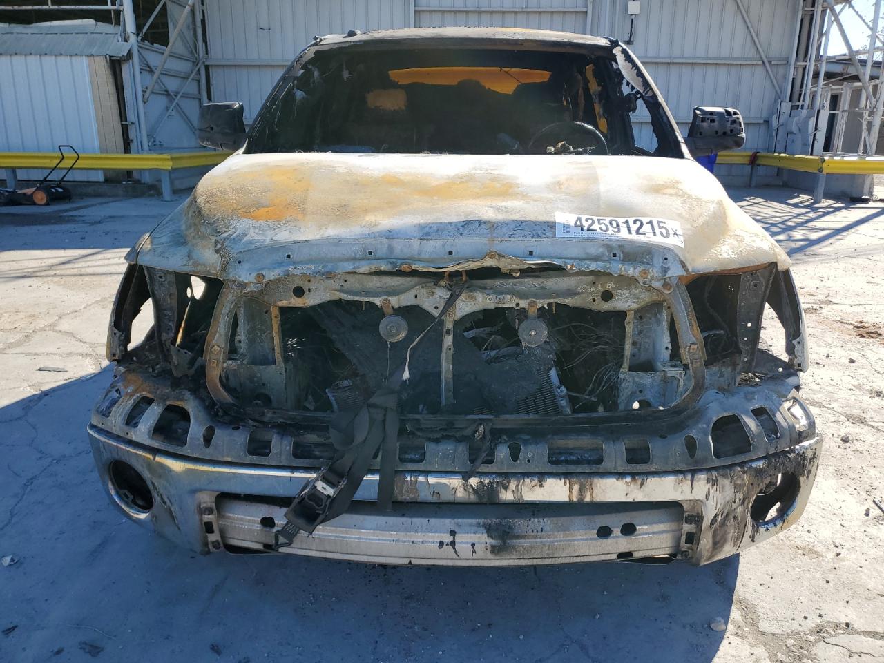 2012 Toyota Tundra VIN 5TFEM5F1XCX043702 Copart auction photo, burn damage thumbnail 5