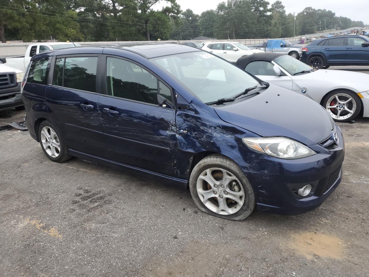 2009 Mazda 5 VIN JM1CR293390331325 Copart auction photo, front end / side damage thumbnail 4
