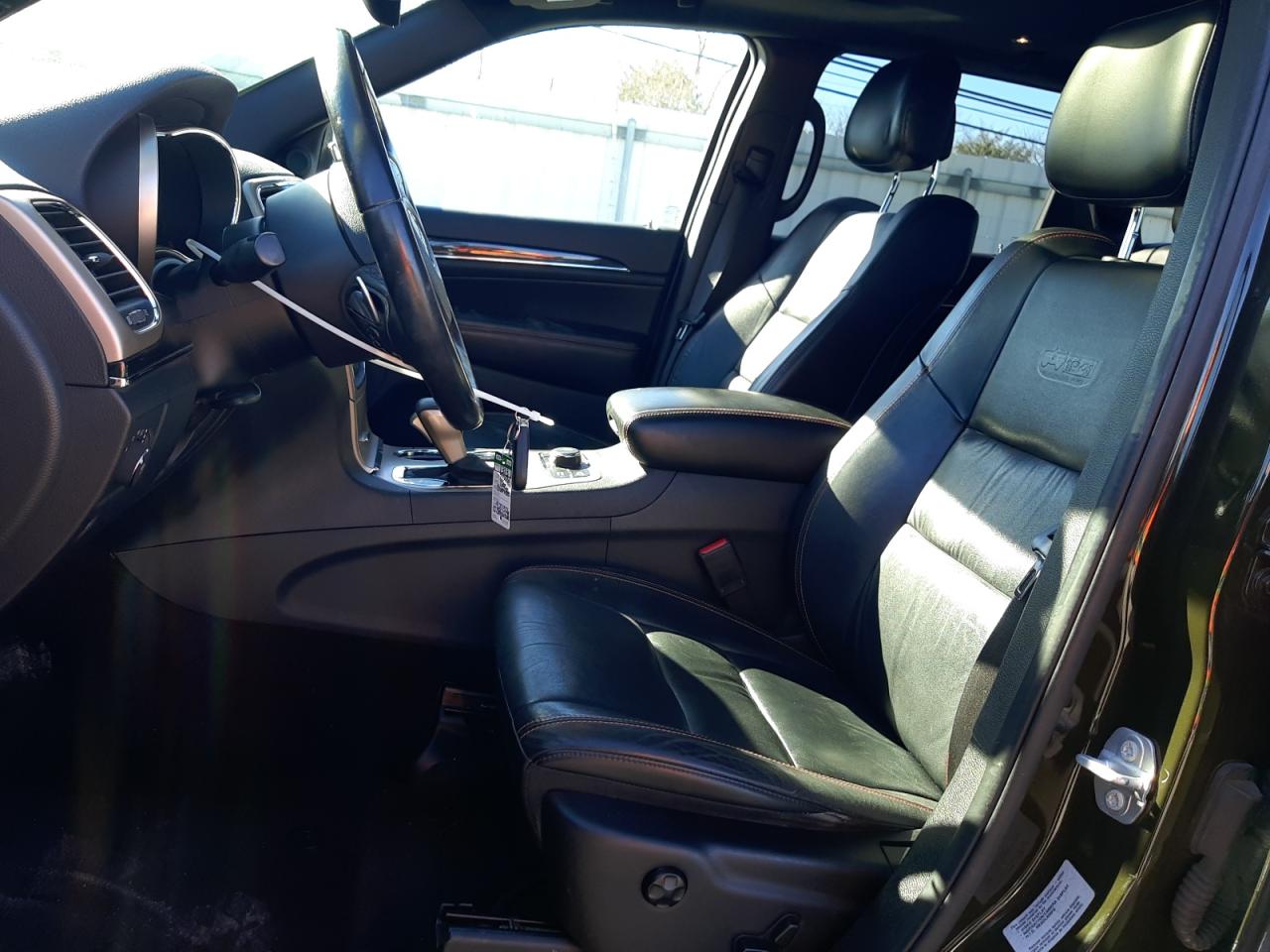 2016 Jeep Grand Cherokee VIN 1C4RJFBGXGC427356 Copart auction photo, side damage thumbnail 7