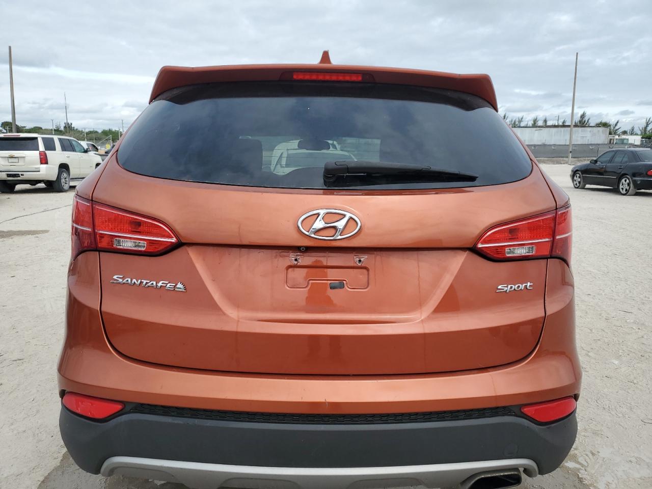 2015 Hyundai Santa Fe VIN 5XYZU3LB3FG296435 Copart auction photo, front end / minor dent/scratches damage thumbnail 6