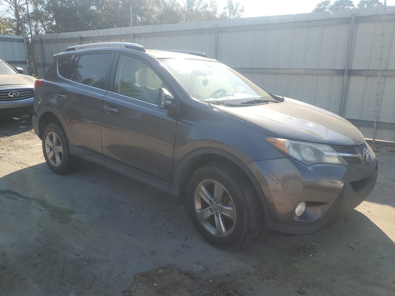 2015 Toyota RAV 4 VIN JTMWFREV4FJ036682 Copart auction photo, front end / side damage thumbnail 4