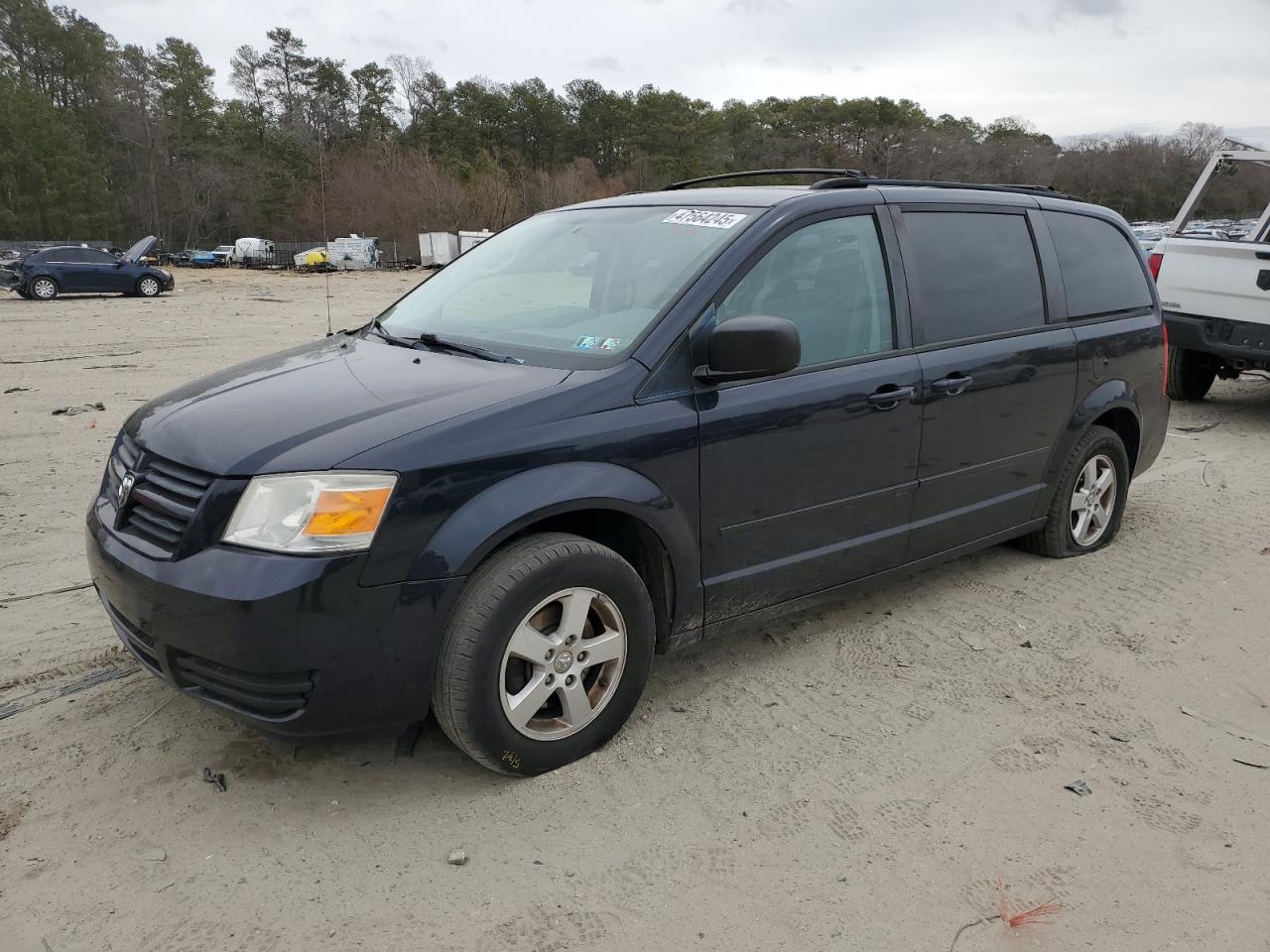 2010 Dodge Caravan VIN 2D4RN3D19AR488209 - Copart auction photo