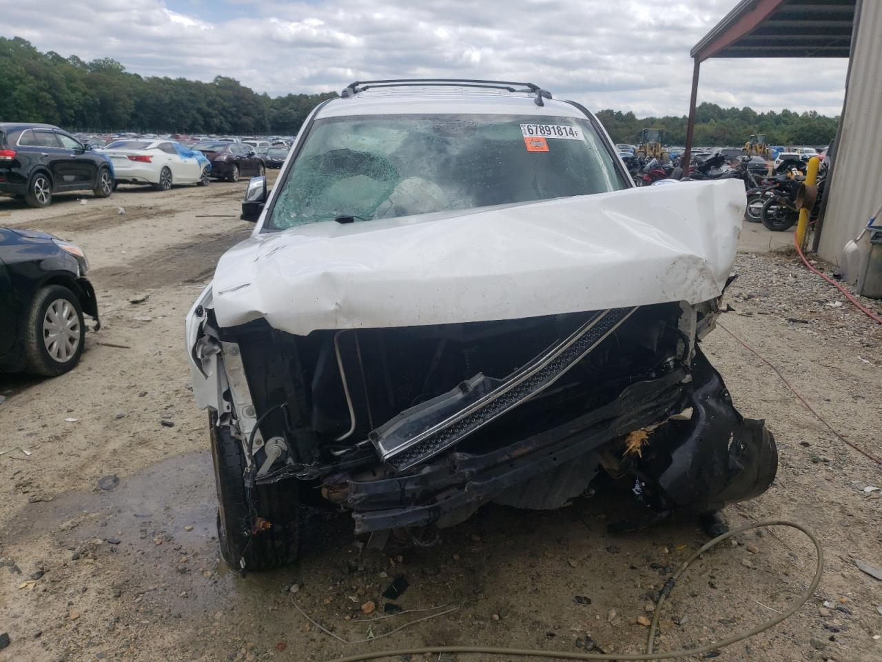 2011 Chevrolet Tahoe VIN 1GNSKAE08BR380793 Copart auction photo, front end / side damage thumbnail 5
