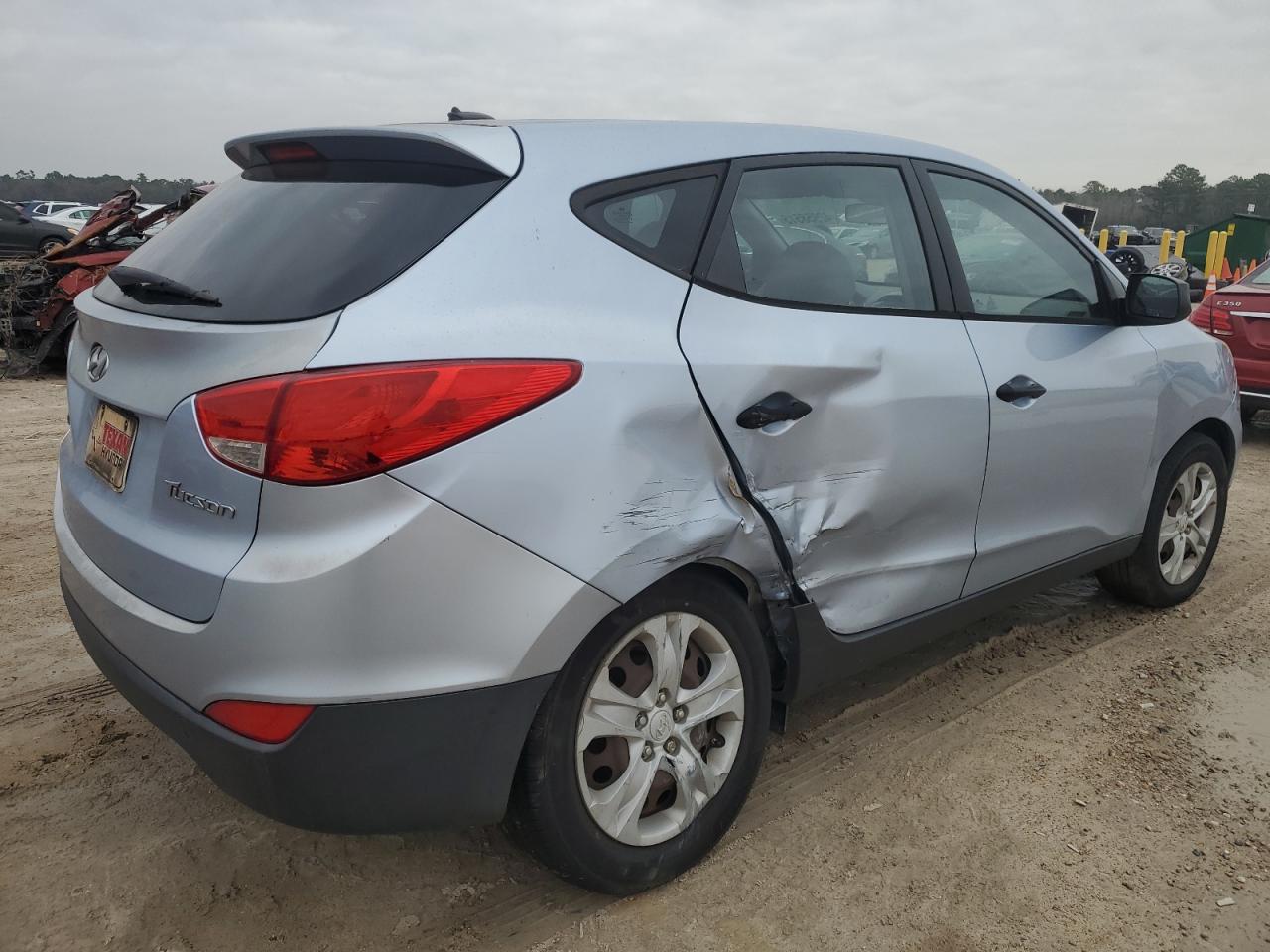 2010 Hyundai Tucson VIN KM8JT3AC1AU084650 Copart auction photo, side / front end damage thumbnail 3