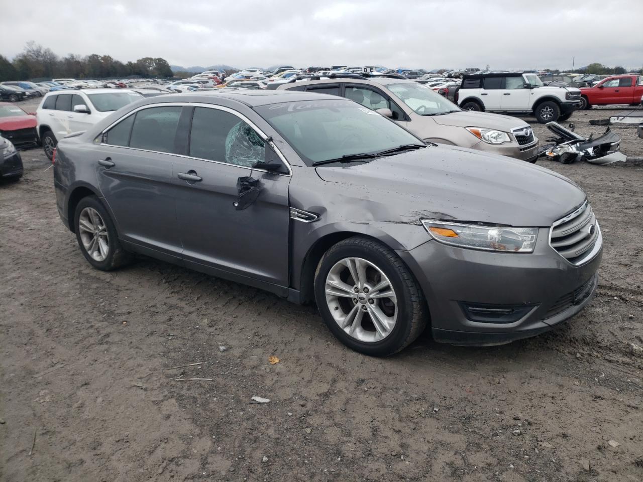 2014 Ford Taurus VIN 1FAHP2E84EG143398 Copart auction photo, all over damage thumbnail 4