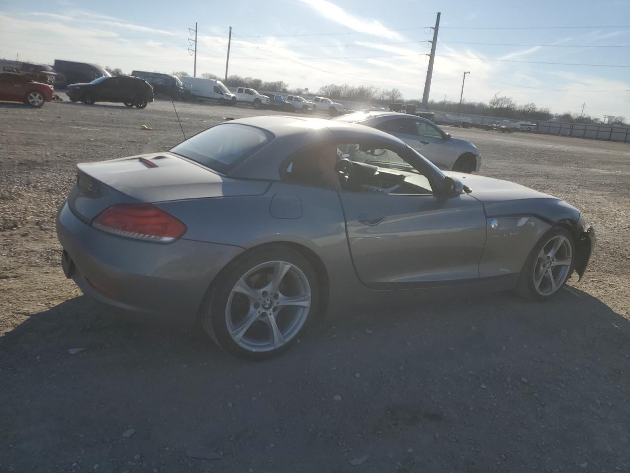 2011 BMW Z4 VIN WBALM5C53BE380525 Copart auction photo, front end damage thumbnail 3