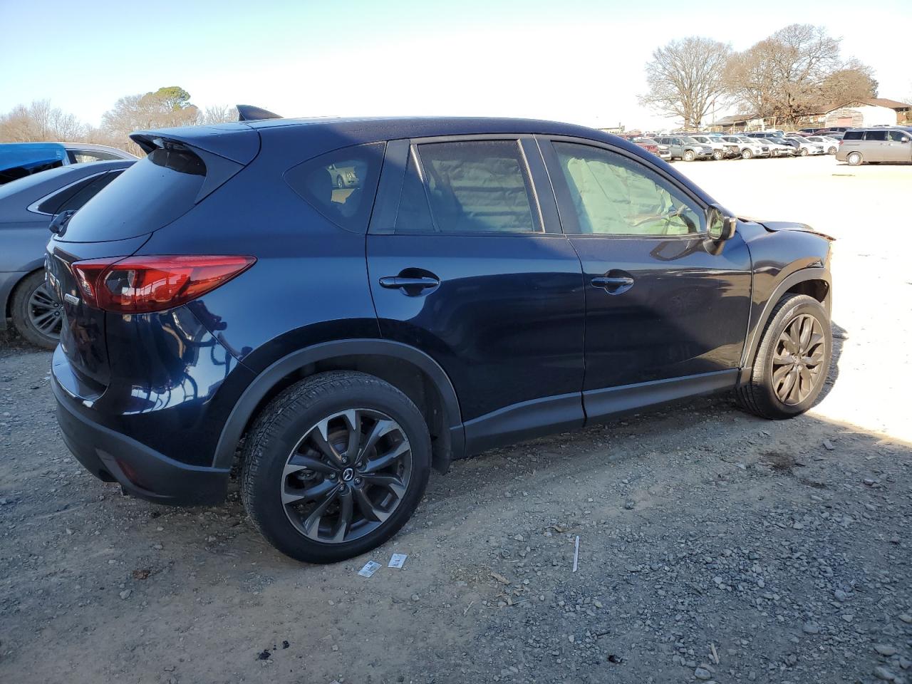 2016 Mazda CX-5 VIN JM3KE4DY4G0810847 Copart auction photo, front end damage thumbnail 3