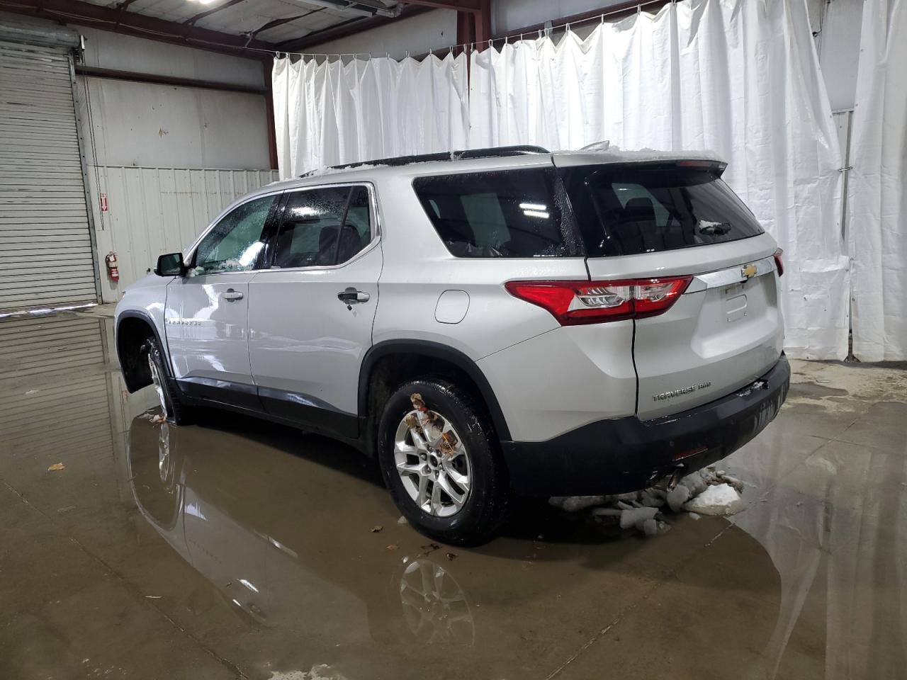 2021 Chevrolet Traverse VIN 1GNEVHKWXMJ148090 Copart auction photo, front end / side damage thumbnail 2