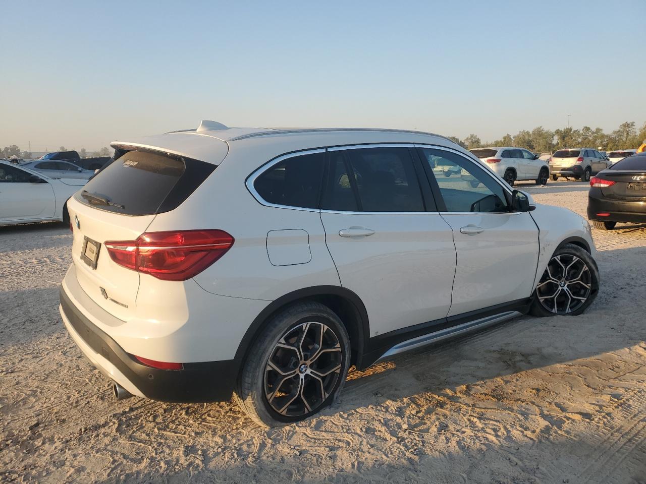 2020 BMW X1 VIN WBXJG9C05L3L81799 Copart auction photo, undercarriage damage thumbnail 3