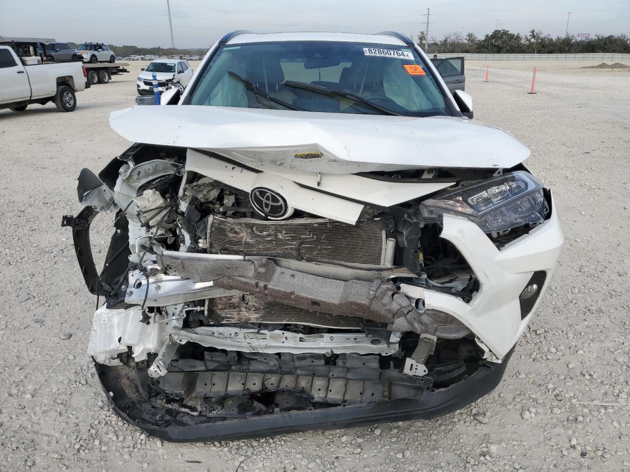 2019 Toyota RAV 4 VIN 2T3P1RFV2KW009414 Copart auction photo, front end / side damage thumbnail 5