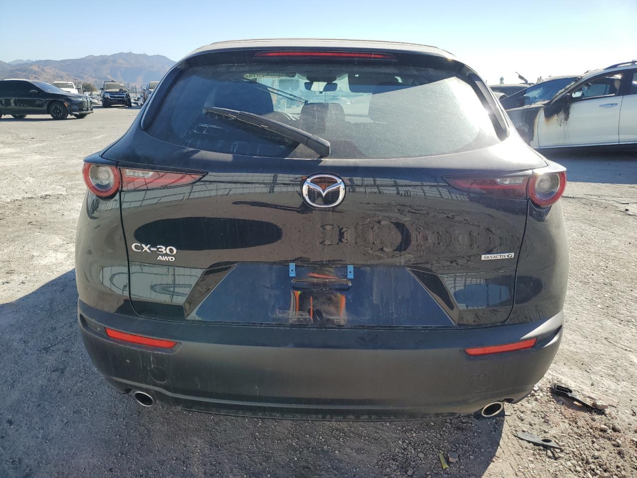 2024 Mazda CX-30 VIN 3MVDMBAM2RM667504 Copart auction photo, front end damage thumbnail 6
