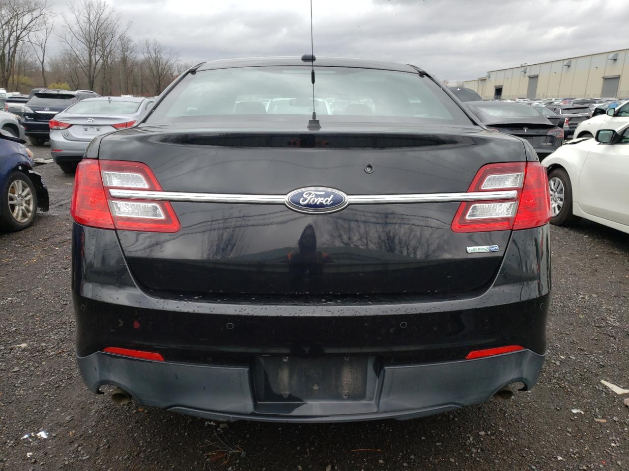 2015 Ford Taurus VIN 1FAHP2MK4FG112599 Copart auction photo, front end / minor dent/scratches damage thumbnail 6