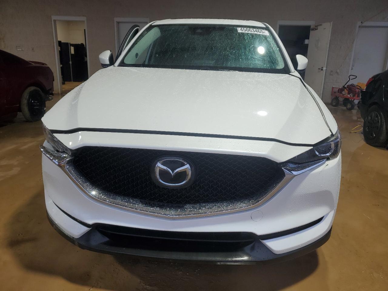 2019 Mazda CX-5 VIN JM3KFACM6K1608461 Copart auction photo, front end / side damage thumbnail 5