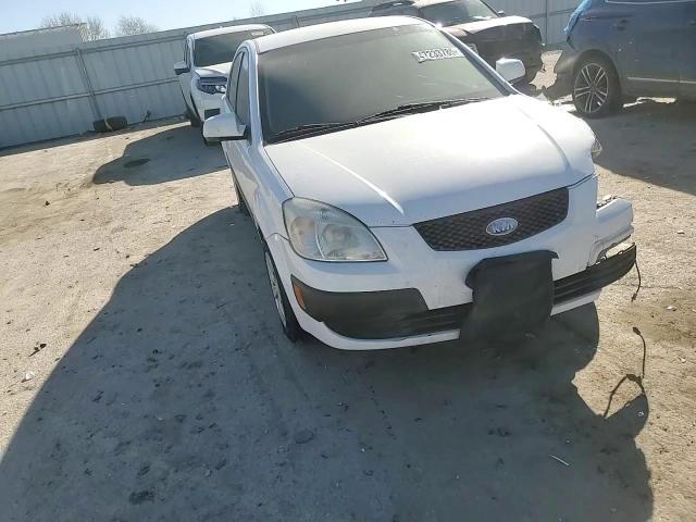 2009 KIA Rio VIN KNADE223296496058 Copart auction photo, front end damage thumbnail 10