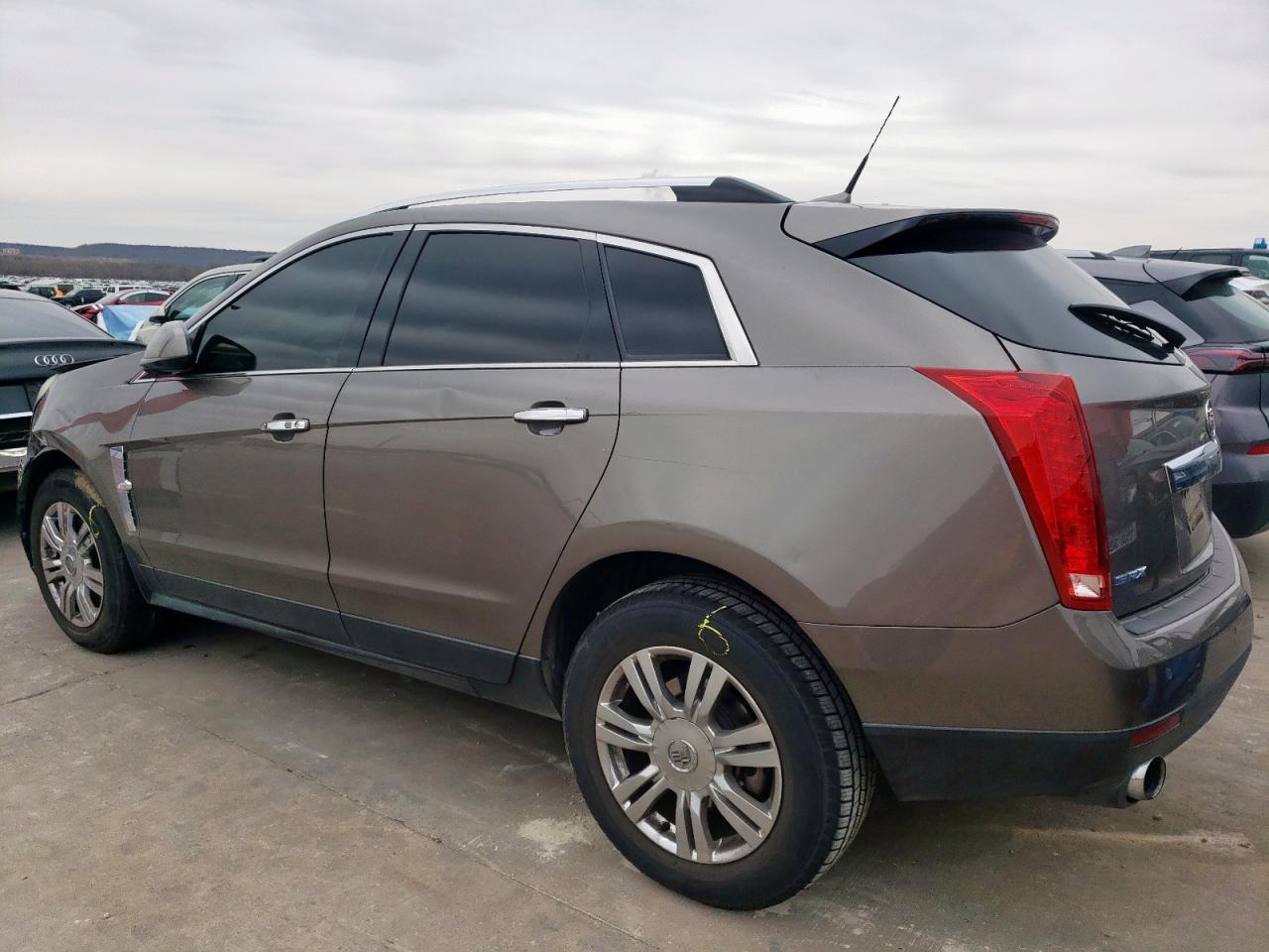 2011 Cadillac SRX VIN 3GYFNBEY2BS639380 Copart auction photo, front end damage thumbnail 2
