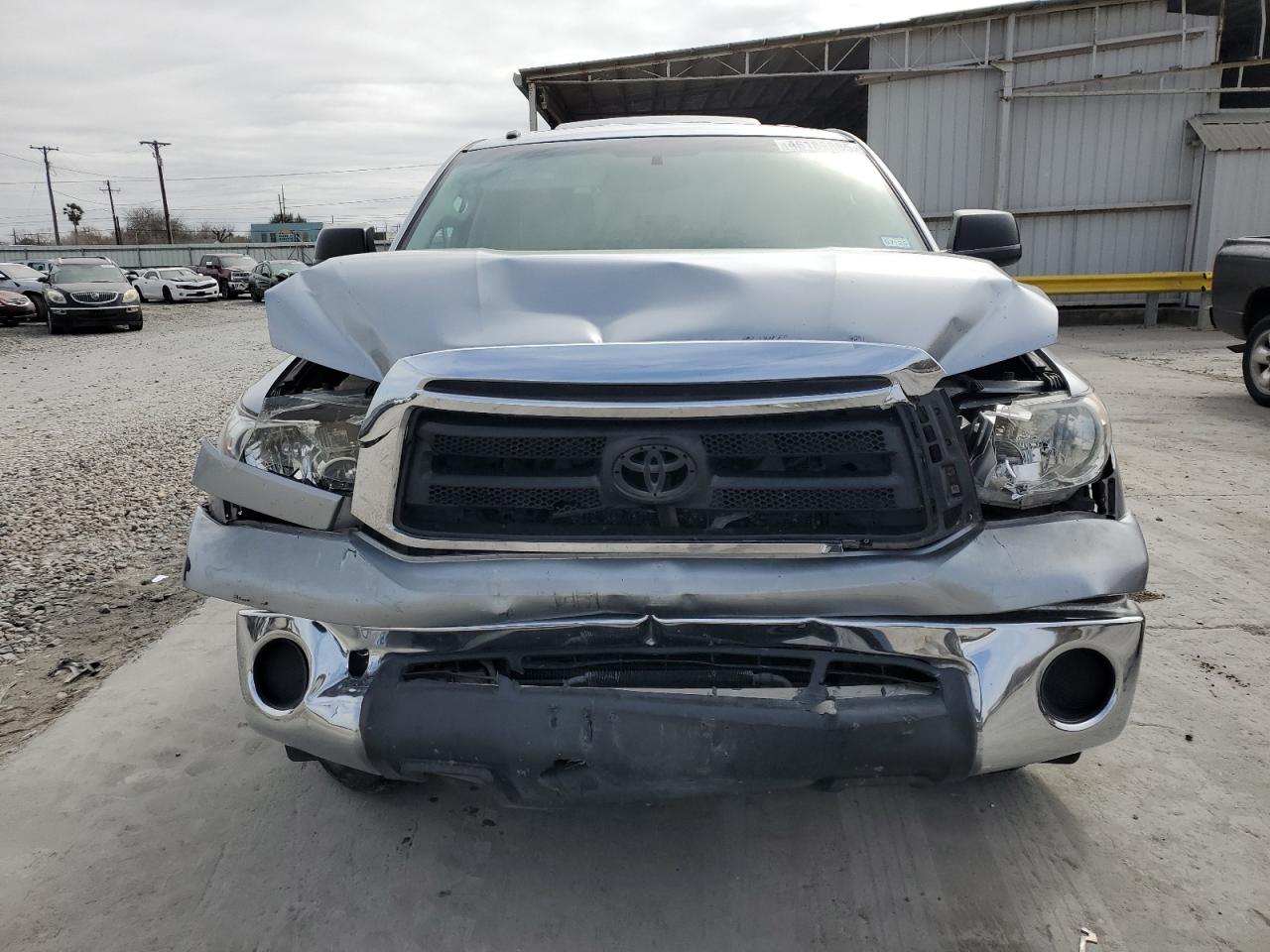 2010 Toyota Tundra VIN 5TFUM5F15AX002435 Copart auction photo, front end / side damage thumbnail 5