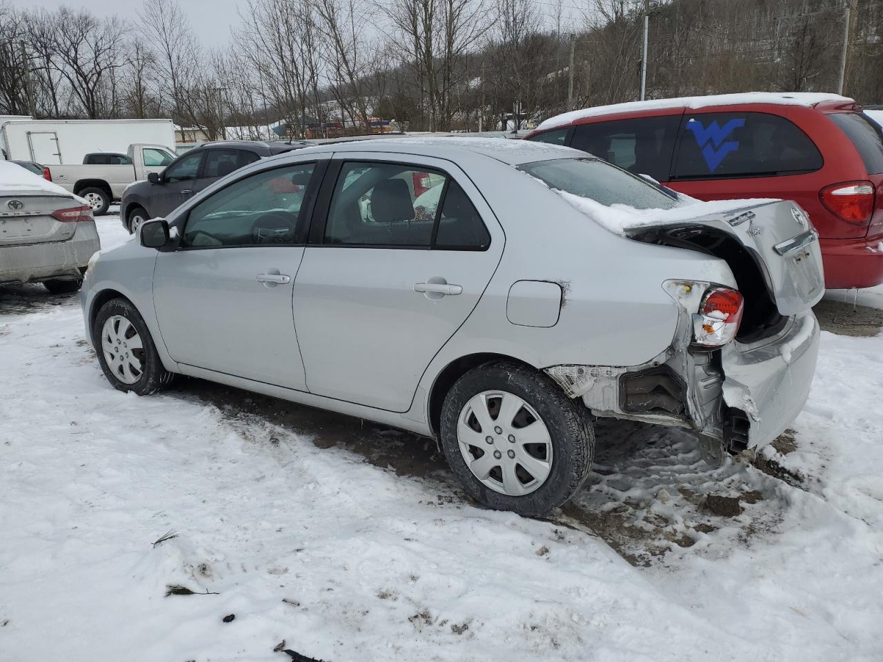 2011 Toyota Yaris VIN JTDBT4K37B1401590 Copart auction photo, rear end damage thumbnail 2