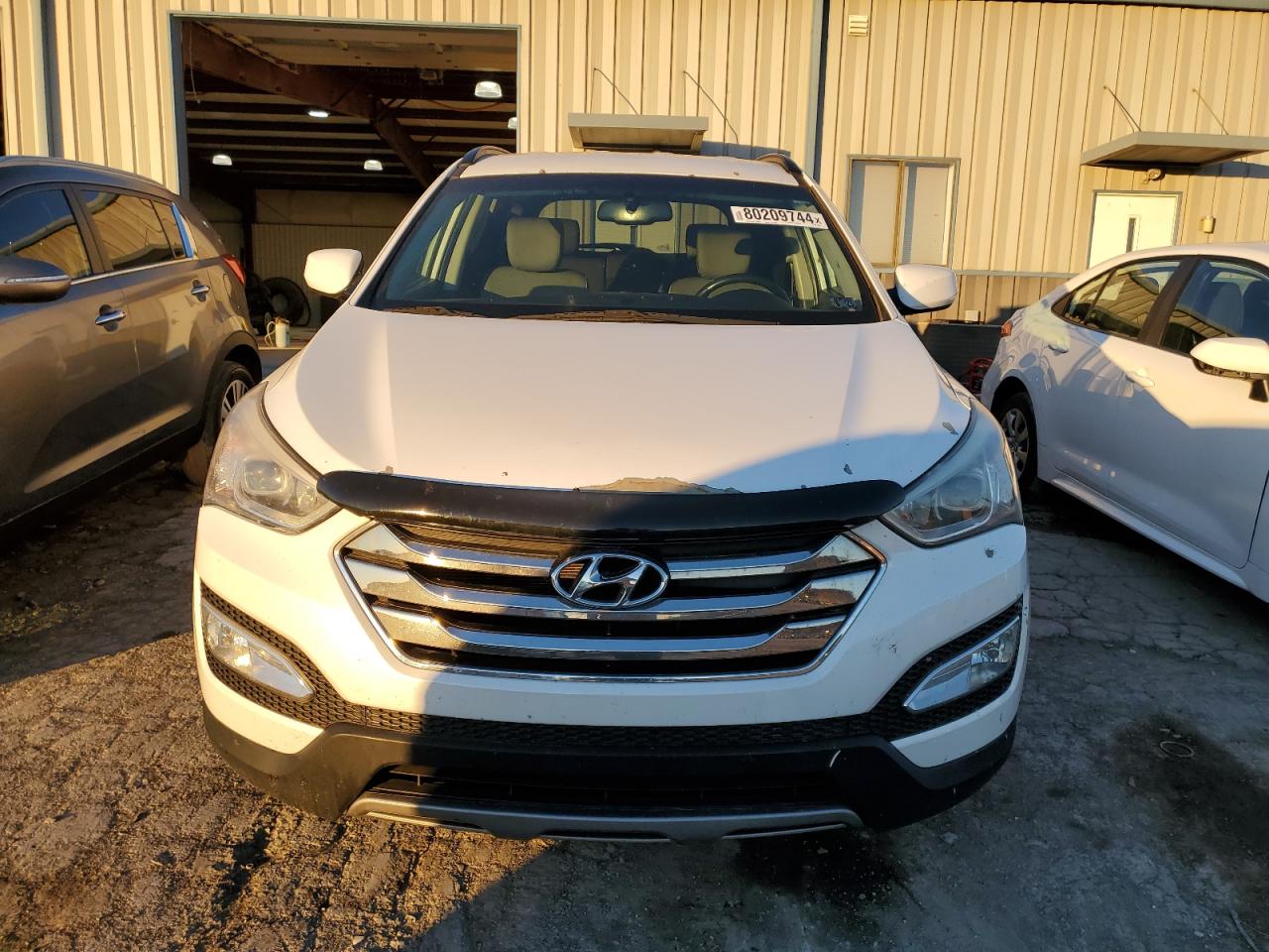 2013 Hyundai Santa Fe VIN 5XYZUDLA9DG060253 Copart auction photo, normal wear / minor dent/scratches damage thumbnail 5