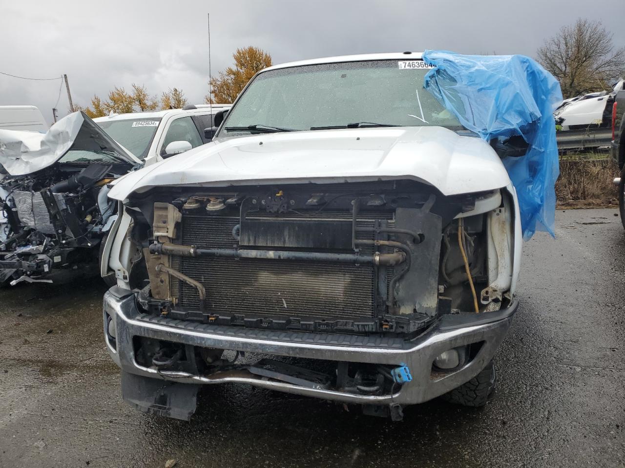 2011 Ford F350 VIN 1FT8X3BTXBEB64241 Copart auction photo, side / front end damage thumbnail 5
