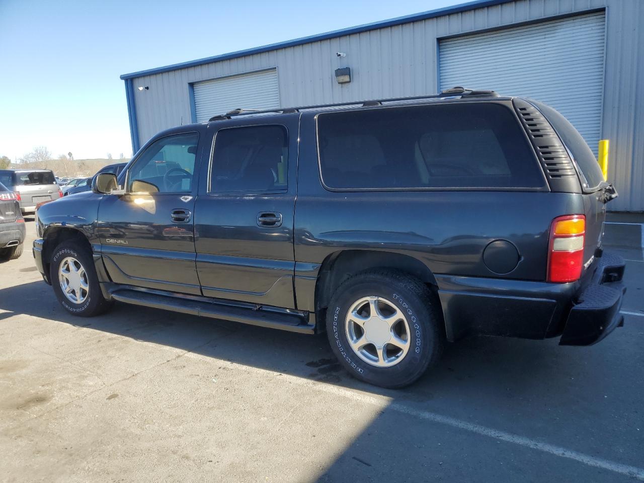 2003 GMC Yukon VIN 1GKFK66U73J291892 Copart auction photo, minor dent/scratches damage thumbnail 2